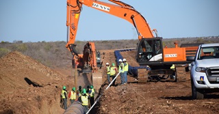 Werken voor bouwprojecten in het buitenland: "Letterlijk en figuurlijk met de voeten in de modder"